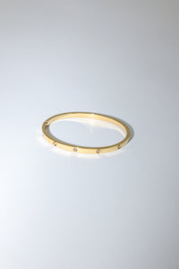 Thin Gold Toned and Crystal Bangle