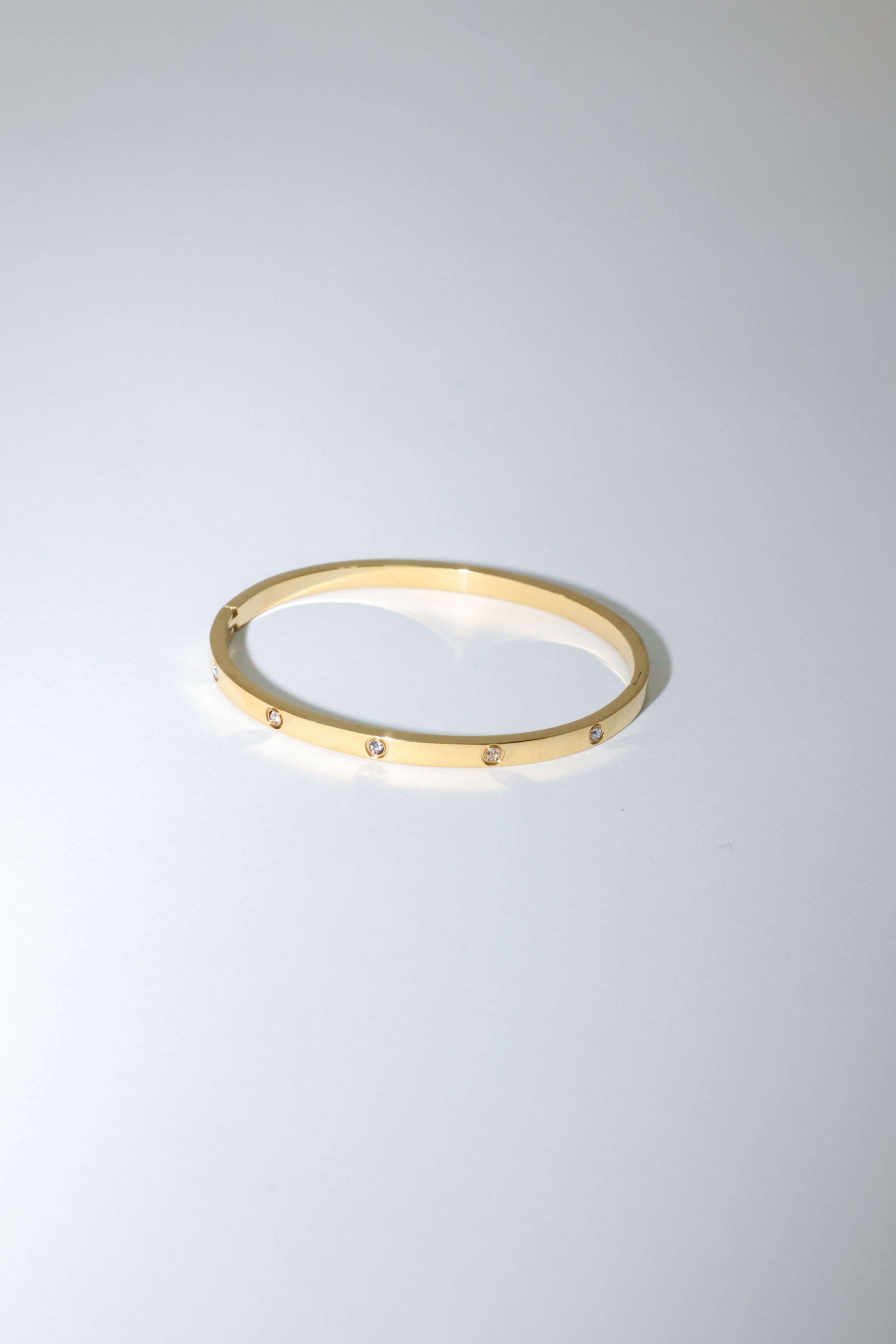 Thin Gold Toned and Crystal Bangle