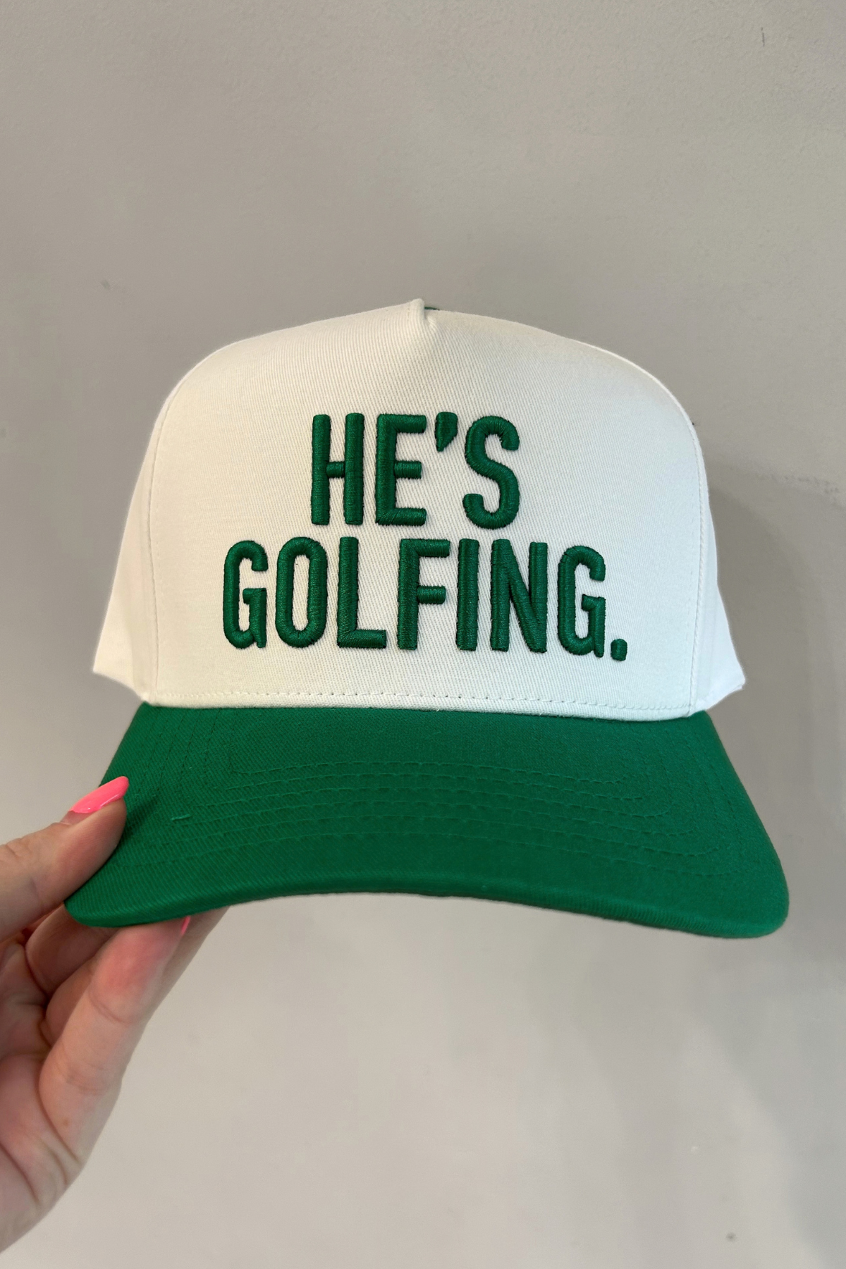 He's Golfing Vintage Trucker Hat