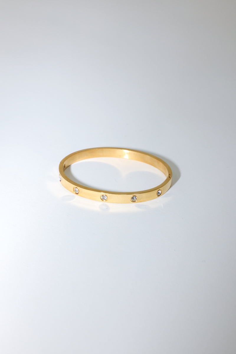 Thick Gold Toned and Crystal Bangle