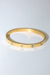 Thick Gold Toned and Crystal Bangle